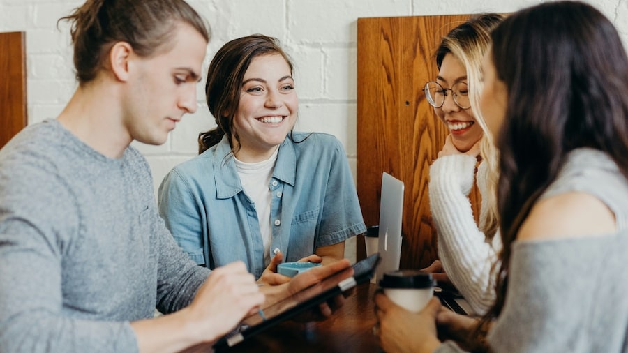 Additional effective marketing techniques for your home decor business A group of people chatting and laughing.