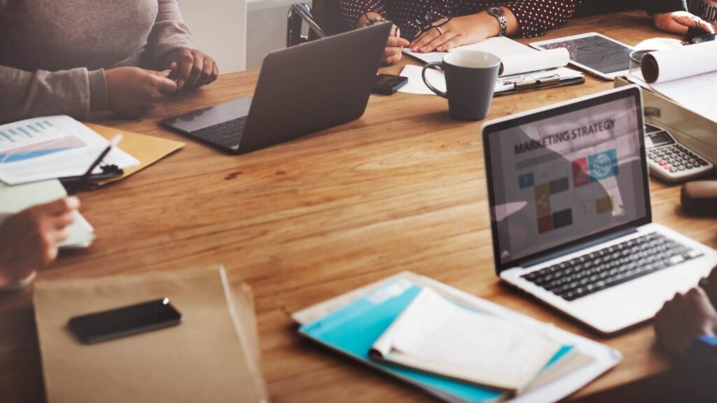 A group of people working on developing a marketing strategy.