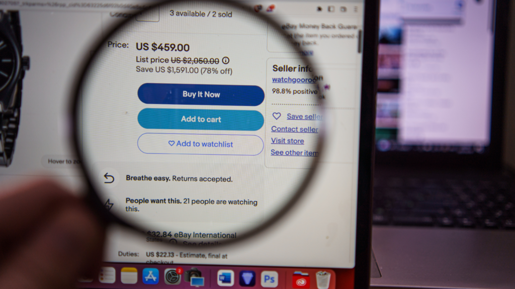 How to increase visibility on eBay An eBay listing under a magnifying glass.