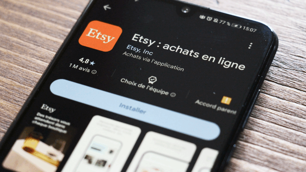 What are the key trend types Etsy sellers need to know Mobile phone with Etsy application on the screen.